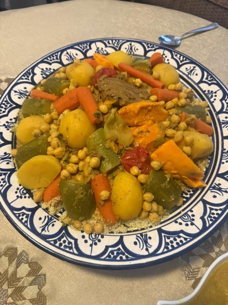 serving-moroccan-couscous.jpg Serving Moroccan couscous at the table