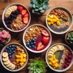 A colorful assortment of smoothie bowls with fresh fruit and toppings.