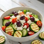 Grilled zucchini Greek salad in a bowl with feta and tomatoes1