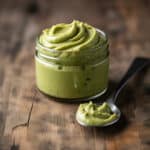 Creamy pistachio butter in glass jar